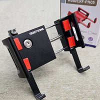 Black and red phone holder with 'RIDEFIXING' branding on a textured surface.