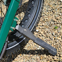 Bicycle tire with a rim guard on a gravel surface
