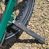Bicycle tire with a rim guard on a gravel surface